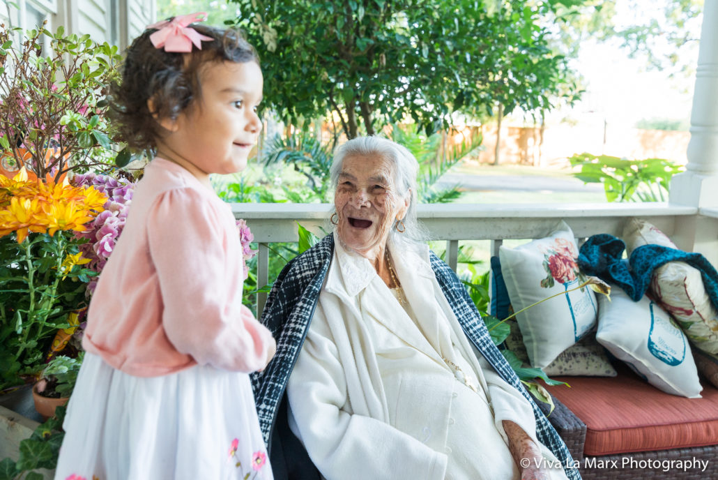 Take photos with grandparents doing candid activities