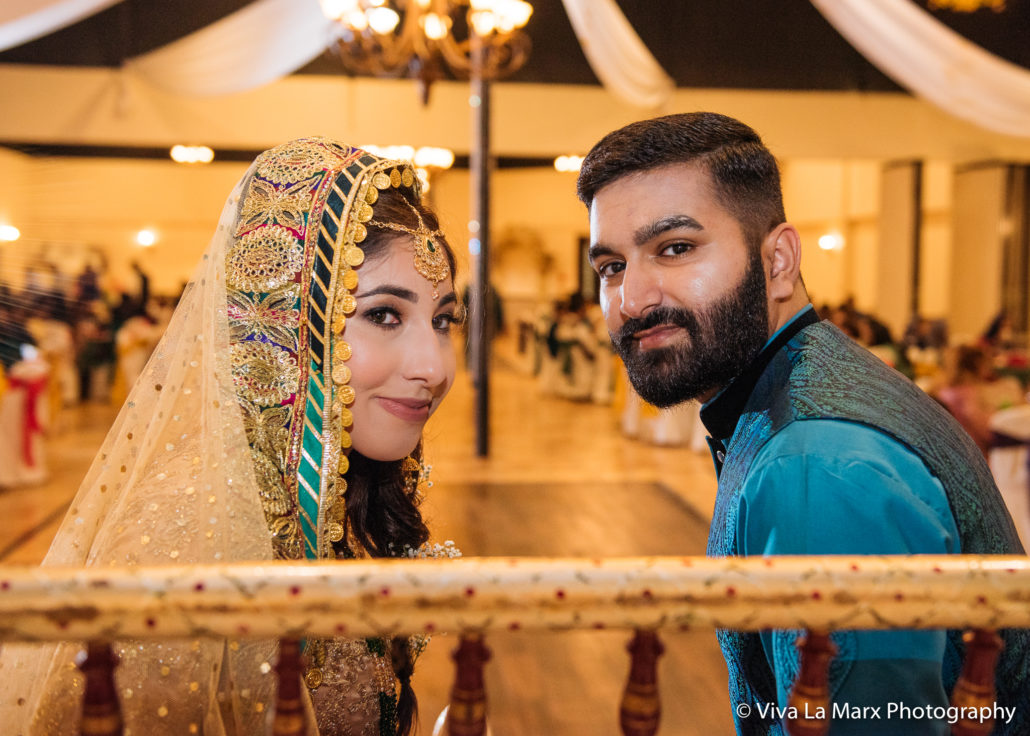 Brinde and groom on their swing at Houston Pakistani Wedding